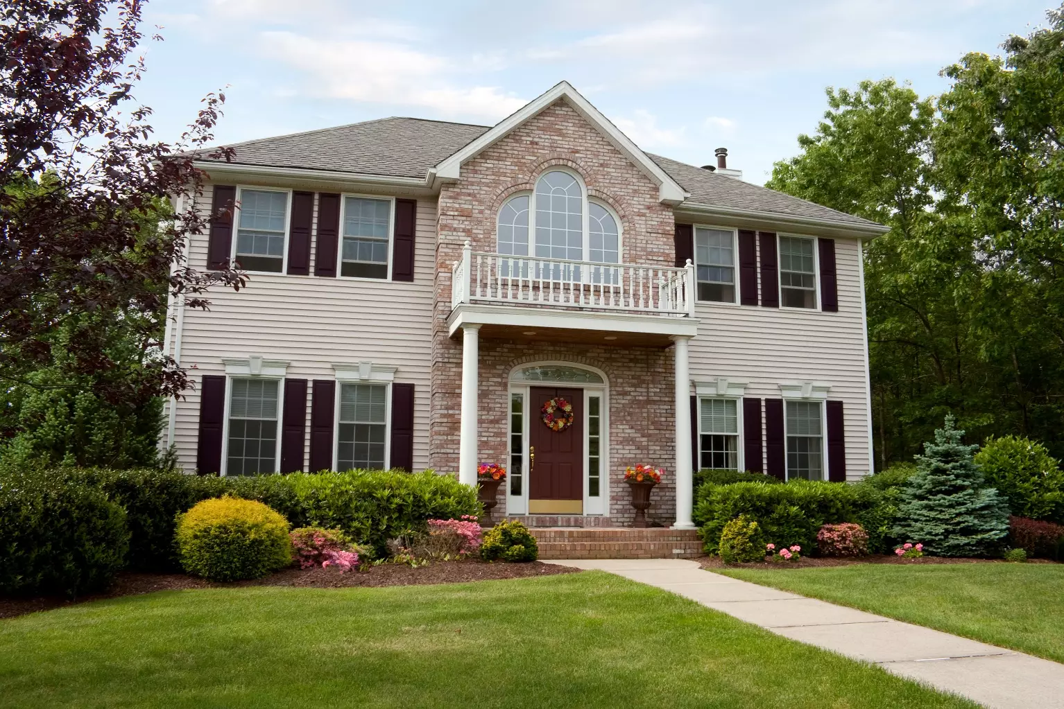 A modern custom built luxury home in a residential neighborhood